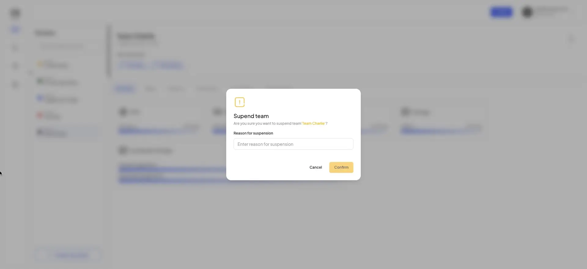 The screenshot shows a confirmation dialog for suspending a team. The user is prompted to enter a reason for the suspension before confirming the action.