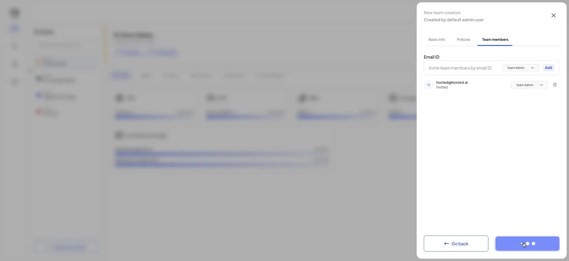 The user is on the "Team members" tab during the new team creation process, where they can invite members by email and assign them roles.